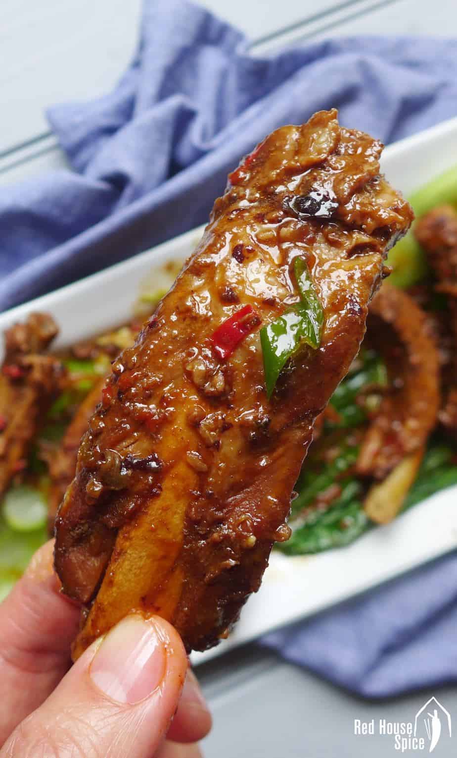A piece of braised spare rib with black bean sauce.