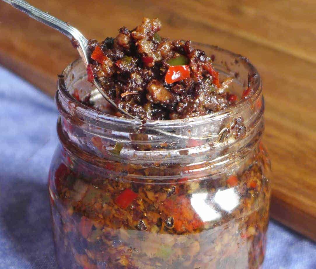 A jar of spicy black bean sauce.