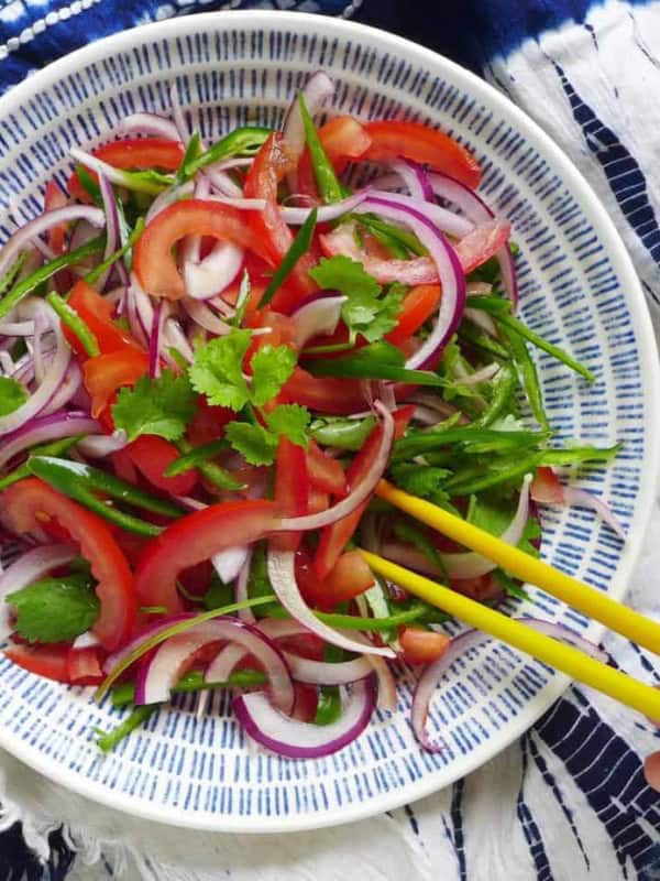 salad made of tomato, onion and coriander