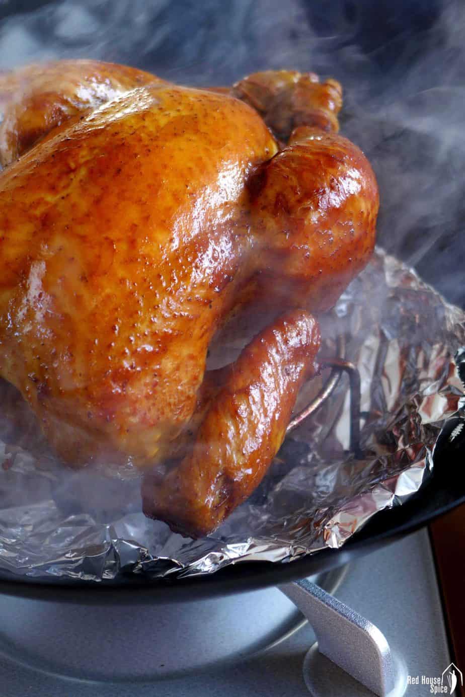 smoking a chicken in a wok