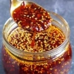 A jar of chili oil with overlay text that says homemade chili oil.