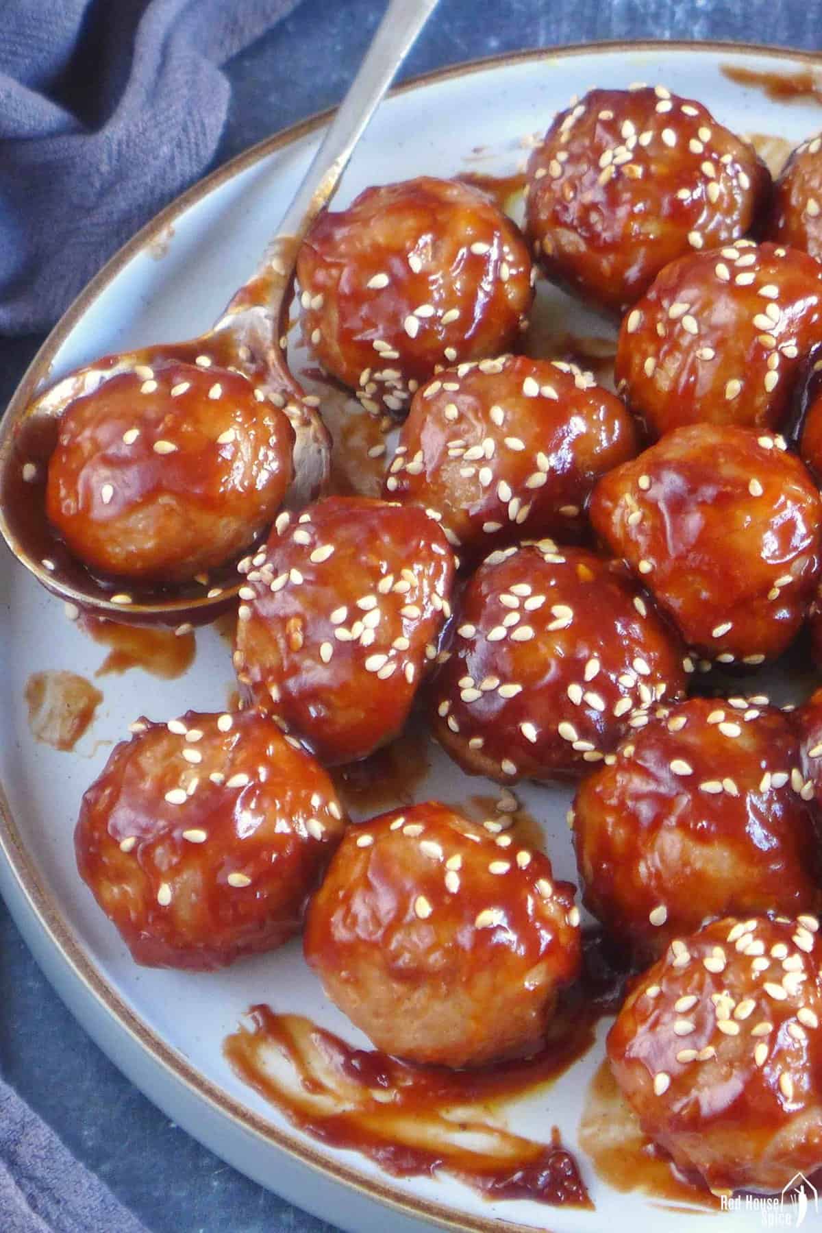 Chinese sweet and sour meatballs on a plate.
