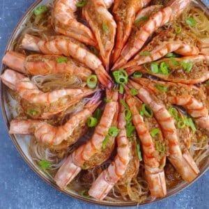 steamed garlic shrimp with vermicelli on a plate.