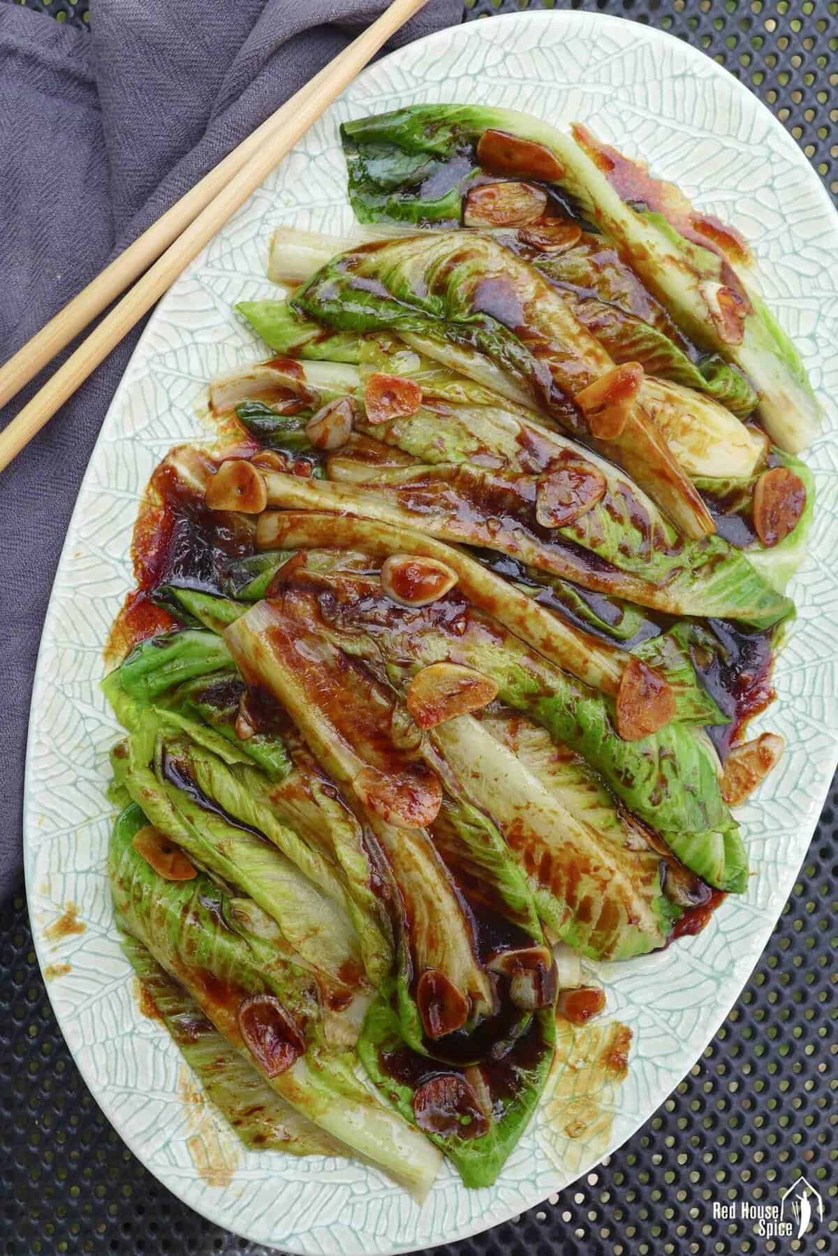Chinese oyster sauce lettuce on a plate.