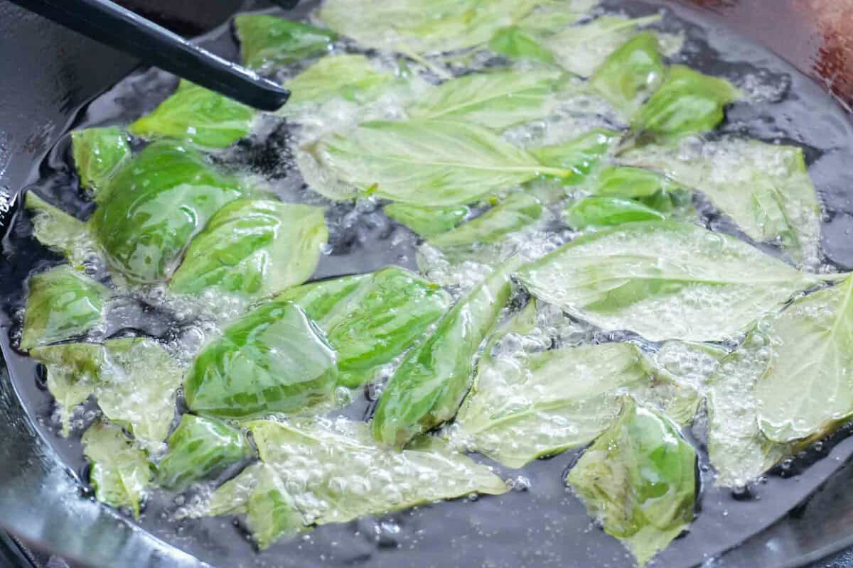 deep frying basil leaves.